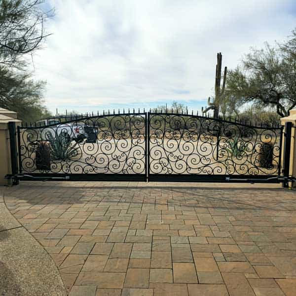 Modern iron driveway gate installation Scottsdale AZ with automated opener